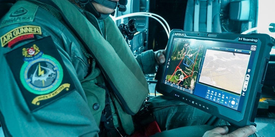 Airbus Pioneers Rugged Tablet for High-Speed Helicopter-Drone Team Control 3 Airbus rugged tablet in a helicopter cockpit, displaying a drone control interface.