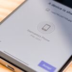 Android phone and iPhone exchanging files wirelessly, symbolizing AirDrop and Quick Share interoperability