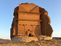 Contemporary art installations and unique designs displayed amidst the ancient desert landscapes and limestone cliffs of AlUla, Saudi Arabia.