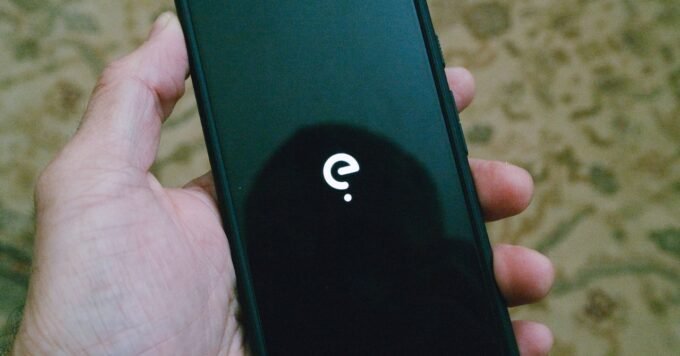 A collage of smartphone screens displaying various alternative operating systems like GrapheneOS, /e/OS, and LineageOS, symbolizing digital freedom and privacy.