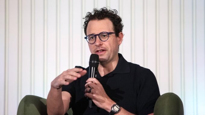 Anthropic CEO Dario Amodei discussing AI ethics with a military official