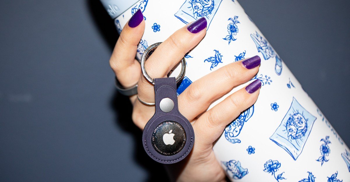 Early Bird Discount: Apple's Second-Gen AirTags Now On Sale! 3 Apple AirTag (second-gen) trackers, showcasing their compact design and the five-pack bundle.