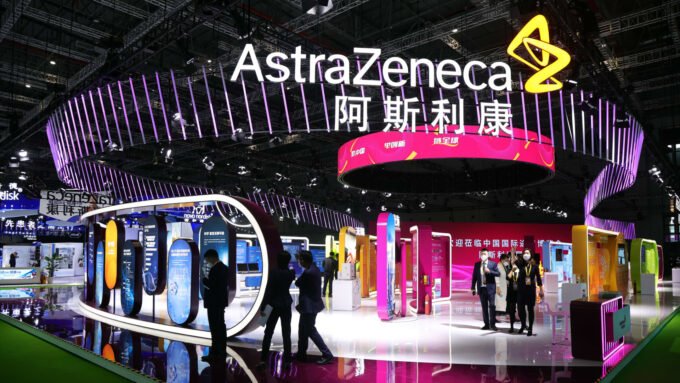 AstraZeneca CEO Pascal Soriot discussing global strategy, with a backdrop representing both the New York Stock Exchange and Chinese innovation hubs.