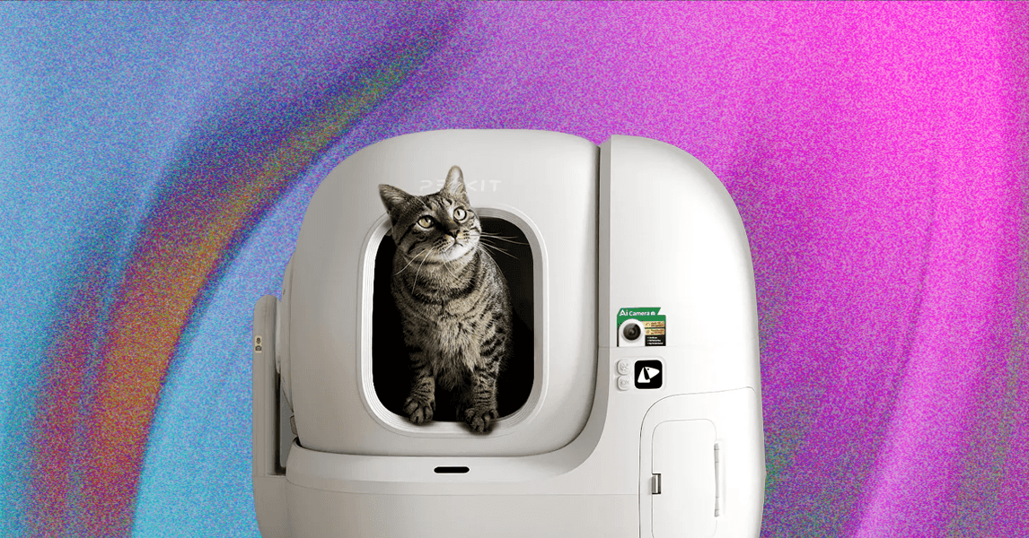 A modern automatic litter box with a cat nearby, symbolizing advanced pet care technology.