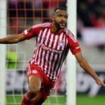 Ayoub El Kaabi celebrating a goal for Morocco or his club, showcasing his achievement as a top international scorer.