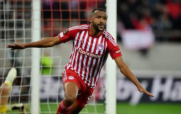 Ayoub El Kaabi: Morocco's Star Striker Joins Global Elite with Top 10 Decade Ranking 5 Ayoub El Kaabi celebrating a goal for Morocco or his club, showcasing his achievement as a top international scorer.