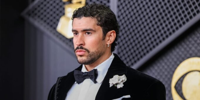 Bad Bunny on the red carpet at the 2026 Grammys, making a statement against ICE policies.