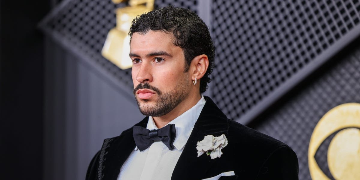 Bad Bunny on the red carpet at the 2026 Grammys, making a statement against ICE policies.