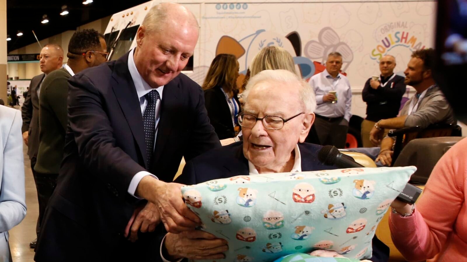 Buffett's Final Quarter: Berkshire Hathaway's Operating Earnings Dip Amid Leadership Transition 3 Warren Buffett and Greg Abel walking through the Berkshire Hathaway Annual Shareholders Meeting in Omaha, Nebraska