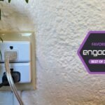 A selection of smart plugs, including the Kasa Smart Plug Mini EP25 and Amazon Smart Plug, arranged on a modern surface.