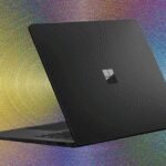 A collage of the Microsoft Surface Laptop 7th Edition and Dell XPS 14 (2026) on a modern desk, showcasing their sleek designs.