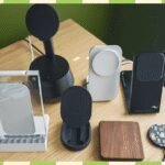 Effortless Power: The 18 Best Wireless Chargers, Expertly Reviewed for 2026 4 A selection of modern wireless charging pads and stands with smartphones on them, showcasing convenience.