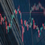 A digital representation of Bitcoin with a downward trendline, illustrating market volatility