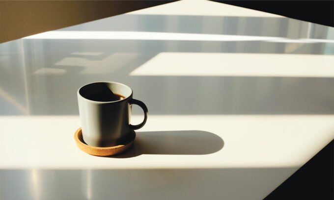 A steaming cup of black coffee, symbolizing health and vitality