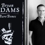 Bryan Adams au Maroc : L'icône du rock à nu pour deux soirées acoustiques inoubliables 4 Bryan Adams sur scène, guitare acoustique à la main, lors d'un concert intime.