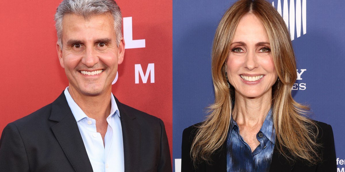 Josh D'Amaro and Dana Walden, Disney executives, in a professional setting, representing a complex leadership dynamic after a CEO succession.