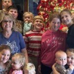 Children laughing and playing together with their cousins in a family setting