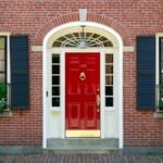 Weekend Wonders: 12 Affordable DIYs to Elevate Your Home's Curb Appeal 4 A beautifully maintained home exterior showcasing vibrant curb appeal from various DIY projects.