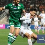 صورة لشعار نادي الرجاء الرياضي أو لقطة من مباراة كرة قدم