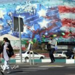 الرئيس الأمريكي دونالد ترامب يتحدث في مؤتمر صحفي حول التوترات مع إيران.