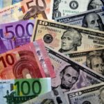 صورة أرشيفية تظهر حاويات شحن في ميناء ألماني، تعكس النشاط التجاري والاقتصادي لألمانيا.