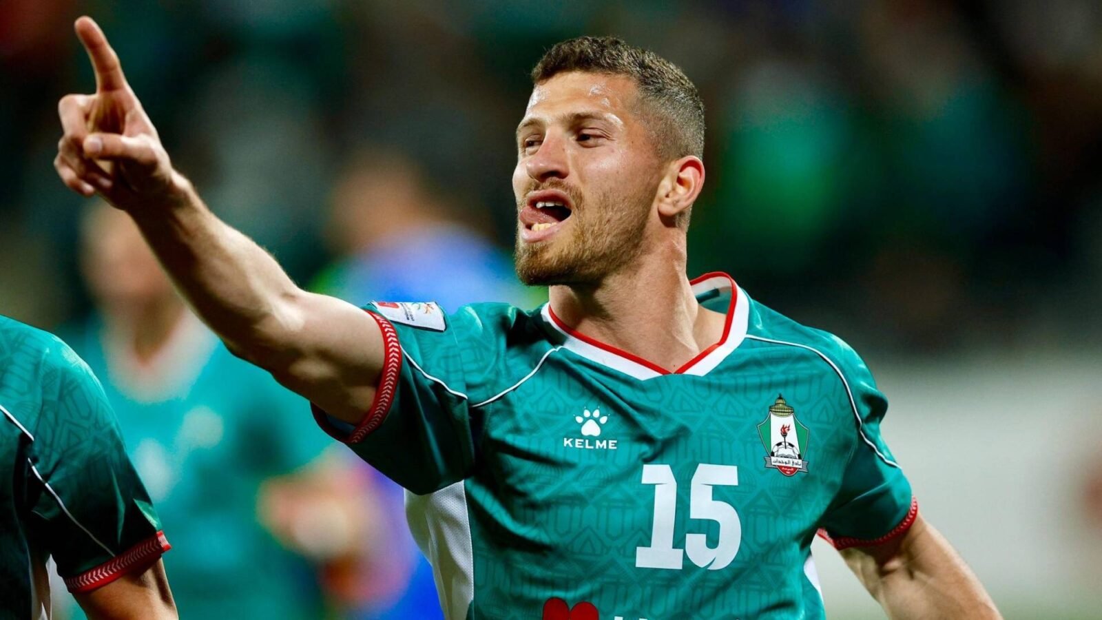 احتفال لاعب الوحدات أنس العوضات بهدف في مرمى الجزيرة خلال مباراة دوري المحترفين الأردني