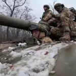 صورة لممثلي الوفود الروسية والأوكرانية والأمريكية في جنيف أثناء المباحثات الدبلوماسية.