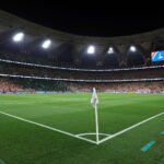 صورة للاعب كرة قدم شاب يرتدي زيًا رياضيًا، تعبيرًا عن ذكرى تركي السعيد.