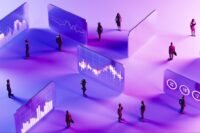 A founder looking at data visualizations on a screen, symbolizing strategic data management and control over business influence.