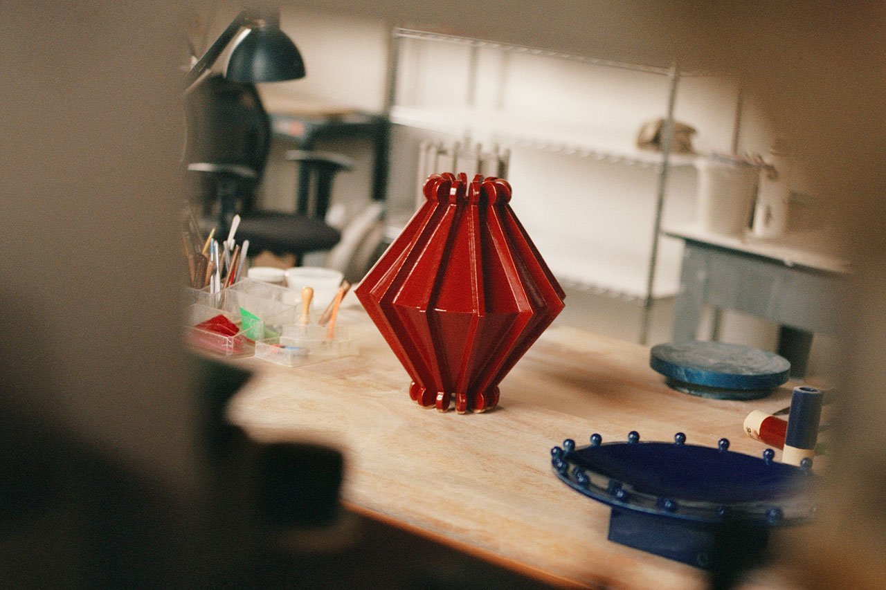 Joseph Sgambati III presenting his 'Take 5' design favorites, featuring colorful objects, ceramic art, and stylish seating.