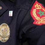 Logo de la Direction Générale de la Sûreté Nationale (DGSN) du Maroc, symbolisant l'autorité et la diligence dans l'enquête.