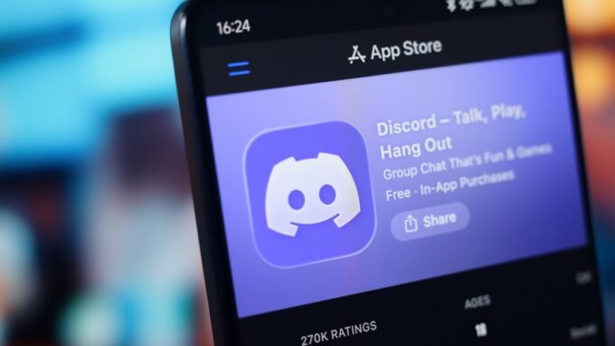 Discord logo with a blurred background, symbolizing privacy and age verification issues
