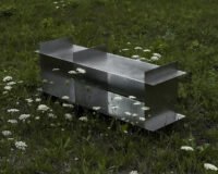 Dot Objects Grid Shelving Unit in a minimalist interior setting, showcasing its clean lines and steel construction.