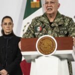Mexican special forces helicopter flying over a rural area during the operation to capture El Mencho