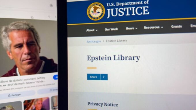 A tablet screen displaying Jeffrey Epstein's portrait next to the U.S. Department of Justice 'Epstein Library' webpage, symbolizing the ongoing fallout.