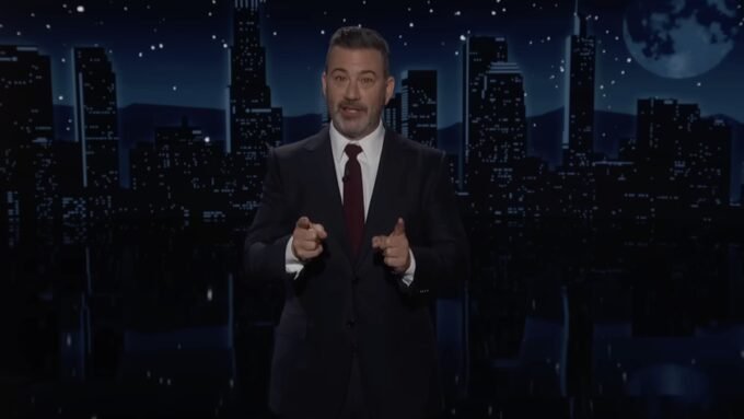 Jimmy Kimmel on stage, with images of Donald Trump and Elon Musk in the background, discussing the Jeffrey Epstein files.