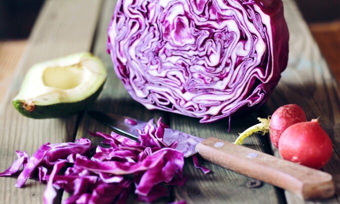 Close-up of a bowl of sauerkraut, illustrating the old-school superfood's gut health benefits.