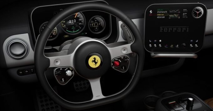 Interior components of the Ferrari Luce EV, showcasing Jony Ive's design with glass and brushed aluminum.