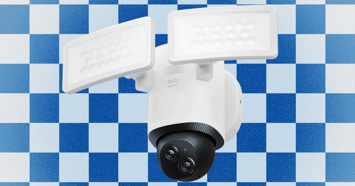 A modern floodlight security camera illuminating a dark outdoor area at night, providing both light and surveillance.