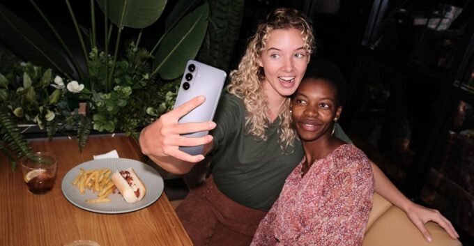 A trio of Samsung Galaxy S26 smartphones showcasing their sleek design and advanced features.