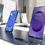 Samsung Galaxy S26 smartphone with a graphic illustrating a $900 trade-in offer.