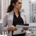 A still from HBO's 'The Pitt' showing medical professionals in a busy emergency room, hinting at the high-stakes environment.