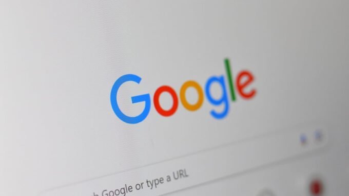 A smartphone screen displaying Google search results with a privacy shield icon, symbolizing data protection.