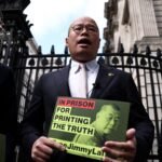 Sebastian Lai, son of jailed Hong Kong pro-democracy media tycoon Jimmy Lai, speaks to the press outside Downing Street in London.