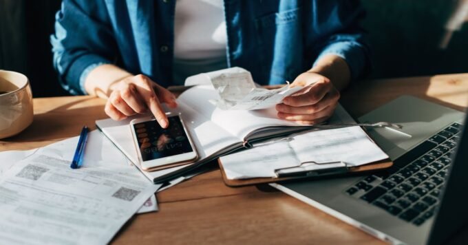 H&R Block DIY Tax Service 2026: A Journalist's Hands-On Review 5 A person using H&R Block's DIY online tax software on a laptop, demonstrating ease of use for 2026 tax filing.