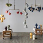 Hwang Bishop Unveils Bloom: A Matte Revolution in Sculptural Ceramic Lighting 4 A multi-tier Bloom chandelier by Hwang Bishop, featuring cascading ceramic shades in soft matte glazes.