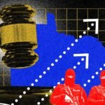 Gavel and law books on a desk, symbolizing the overwhelmed US court system due to immigration cases