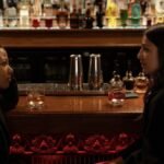 Myha'la and Marisa Abela as Harper Stern and Yasmin Kara-Hanani in Industry, looking at each other intensely.