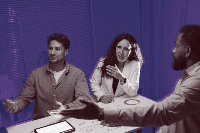 A founder shaking hands with an investor, with a blurred background suggesting a complex business deal and the importance of alignment.