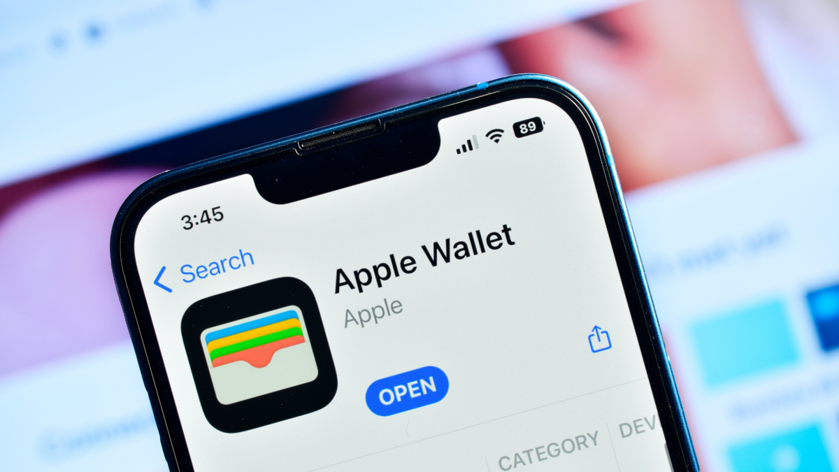 iPhone screen displaying Apple Wallet's credit card autofill options during an online purchase.
